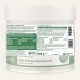Behälter für Haustierergänzungen für Hunde und Katzen, 500 g, mit Text, der den Reichtum an Kalzium, die Gelenkstabilität und Fütterungsempfehlungen hervorhebt.