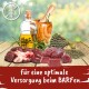 Rohe Haustierfutterzutaten wie Innereien, Rindfleisch, Kräuter und Öl, mit dem Text "für eine optimale Versorgung beim BARFen" darunter.