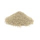 A mound of light-colored cat litter granules, featuring small, irregularly shaped particles, against a white background.