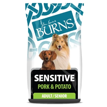 Dog food packaging featuring two dogs, labeled "SENSITIVE PORK & POTATO," suitable for adult and senior dogs.