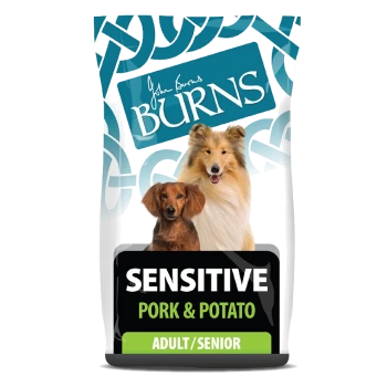 Dog food packaging featuring two dogs, labeled "SENSITIVE PORK & POTATO," suitable for adult and senior dogs.