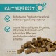 Kaltgepresste Haustierfutterpellets, die sanfte Produktionsmethoden und den Erhalt von Nährstoffen wie Proteinen und Vitaminen hervorheben.