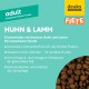 Hundefutter für Erwachsene mit Huhn und Lamm, das ein getreidefreies Rezept, Omega-3- und Omega-6-Fettsäuren für ein glänzendes Fell und Unterstützung für die Zahnpflege hervorhebt.