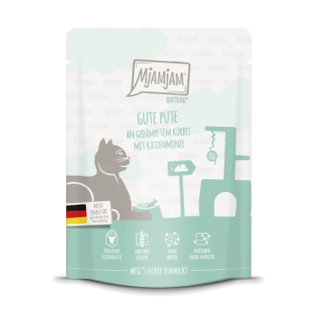 Mjamjam Katzenfutterbeutel mit einer grauen Katzensilhouette, beschriftet mit "GUTE PUTE an gedämpftem Kürbis mit Katzenminze" und Qualitätssymbolen.
