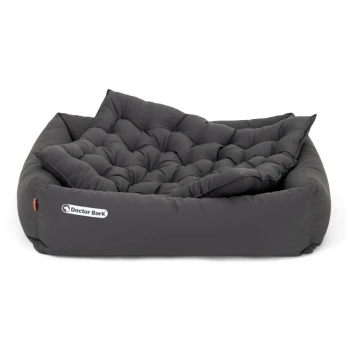 Graues rechteckiges Haustierbett mit gepolstertem Design und 'Doctor Bark'-Logo an der Seite.