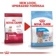 Two Royal Canin dog food bags: "Junior" for medium dogs and "Puppy" (11-25 kg), with text "NEW LOOK, UPGRADED FORMULA."