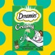 Grüne Verpackung von Dreamies Creamy Katzenleckerlis mit einer Cartoonkatze, die einen Leckerbissen hält, mit dem Text 'mit unwiderstehlicher Katzenminze' und '4x10g'.