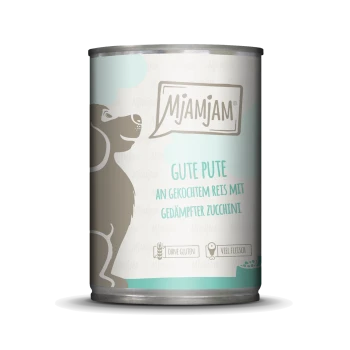 Dose mit Hundefutter mit einer grauen Hundesilhouette, beschriftet "Mjamjam Gute Pute", glutenfrei, fleischreich, mit Reis und Zucchini.