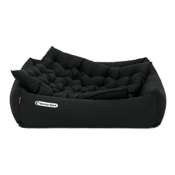 Schwarzes rechteckiges Hundebett mit einem gepolsterten Design, mit dem Logo 'Doctor Bark' auf der Vorderseite.