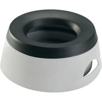 Eine moderne Futterschüssel für Haustiere mit einem schwarzen oberen Rand und einem weißen Boden, gestaltet mit einer Griffaussparung für einfaches Anheben.