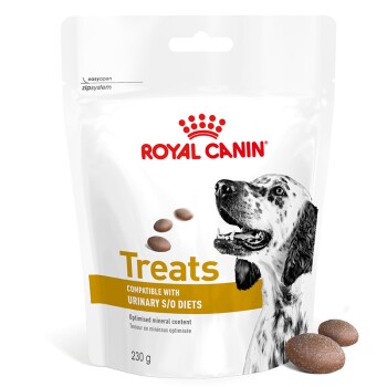 Royal Canin honden traktaties verpakking met een zwart-witte hondenillustratie, gelabeld 'Traktaties Compatibel met Urinary S/O Dieet,' 230g.