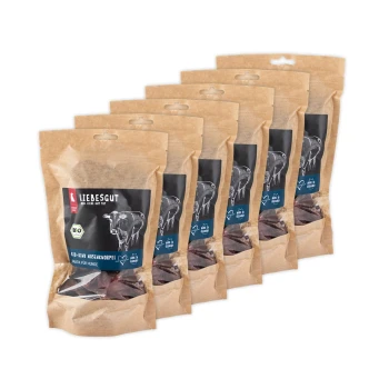 Sechs wiederverschließbare Kraftpapierbeutel mit Liebesgut-Hundesnacks, Kuh-Illustration und gut sichtbaren Aufdrucken „LIEBESGUT“ und „BIO“