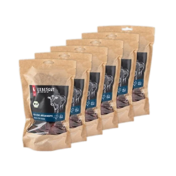 Sechs wiederverschließbare Kraftpapierbeutel mit Liebesgut-Hundesnacks, Kuh-Illustration und gut sichtbaren Aufdrucken „LIEBESGUT“ und „BIO“