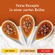 Drei Löffel Tierfutter in Brühe. Text: 'Feine Rezepte in einer zarten Brühe.' Buttons: 'MIT HUHN', 'MIT TRUTHAHN', 'MIT RIND'.
