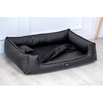 Schwarzes Haustierbett mit weichem Innenraum und erhöhten Rändern, ausgestattet mit einem kleinen Kissen und einem "tierlando"-Logo-Tag.