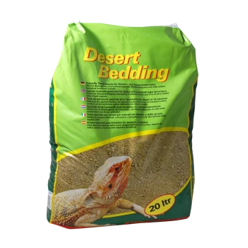 Sac vert étiqueté "Desert Bedding" pour reptiles, avec une image de dragon barbu et une capacité de 20 litres, avec un texte multilingue sur l'utilisation.