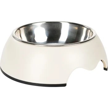 A modern pet food bowl with a cream-colored base and a shiny stainless steel interior, featuring a non-slip black rubber bottom.
