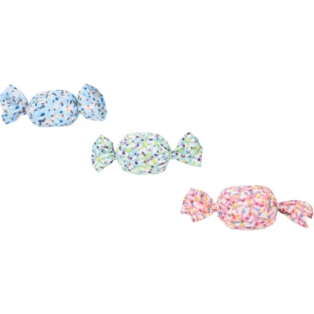 Three colorful plush candy-shaped dog toys in blue, green, and pink, featuring playful sprinkle patterns.