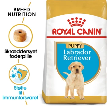 Royal Canin Labrador Retriever Welpenfutterbeutel mit rassespezifischer Ernährung, einer Kibble-Illustration und dänischem Text über Immunsupport.