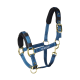 Blaues Haustiergeschirr mit gepolsterten Riemen und goldenen Metallbeschlägen, mit dem Markennamen "Stubben" deutlich angezeigt.