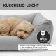 Graues Haustierbett mit abnehmbarem, waschbarem Bezug mit Reißverschluss, deutscher Text über einfache Pflege und Hygiene.