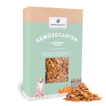 Paws & Patch 'Gemüsegarten Kürbis' Hundekürbis-Flocken, mintgrüne Schachtel mit Sichtfenster, das Flocken zeigt, und einem Haufen daneben.