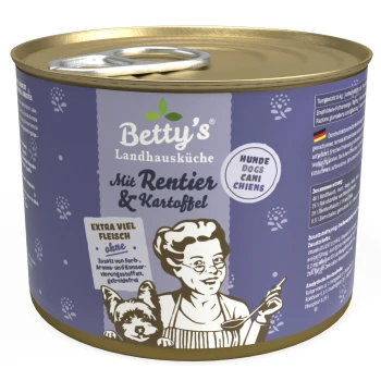Dosenhundefutter "Betty's Landhausküche mit Rentier & Kartoffel" mit einem Cartoon-Koch, einem kleinen Hund und dem Text "extra viel Fleisch."