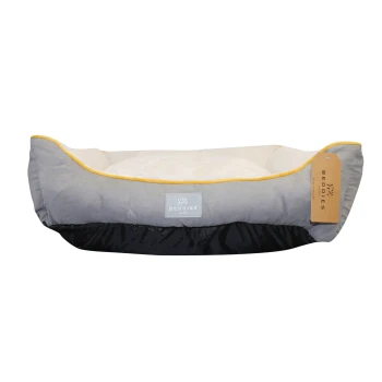 Gray pet bed with yellow trim and a plush interior, featuring a Beddies tag.