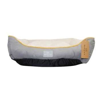 Gray pet bed with yellow trim and a plush interior, featuring a Beddies tag.