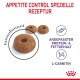 Hundefutter-Kibble mit einem Loch in der Mitte, beschriftet "Appetitkontrolle Spezielle Rezeptur", mit Details zu Protein-, Fettgehalt und L-Carnitin.