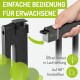 Mechanismus für ein Haustiergitter, der mit einer Hand demonstriert wird. Text: "Einfache Bedienung für Erwachsene" und "Öffnet immer in Geh-Richtung, verriegelt bei 90°."