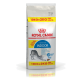 Sac de nourriture pour chat Royal Canin Indoor, 12 kg, avec une illustration de chat gris, avec le texte "10KG+2KG GRATUITS" et "Home Life INDOOR 27."