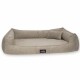 Ein plüschiges, beiges Haustierbett mit erhöhten Rändern und einem kleinen passenden Kissen, ausgestattet mit einem schwarzen Etikett mit dem Markennamen 'tierlando.'