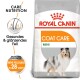 Royal Canin Coat Care Mini Hundefutterbeutel mit einem lächelnden Shetland Sheepdog, mit Text, der die Pflegeernährung für gesundes, glänzendes Fell hervorhebt.