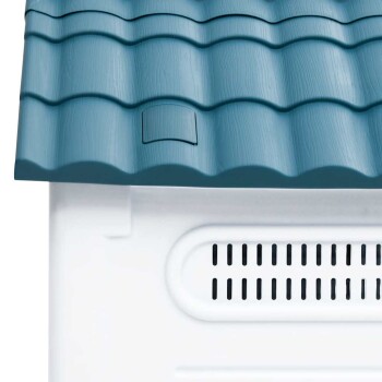 Blaue Haustierhütte mit einem strukturierten Design und weißem Boden, mit Belüftungsöffnungen an der Seite.