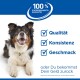 Fröhlicher dreifarbiger Hund mit 100 % Zufriedenheitsgarantie und Häkchen für Qualität, Konsistenz und Geschmack im deutschen Text.