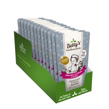 Eine Ausstellungsbox mit Katzenfutterbeuteln von Betty's Landhausküche, mit "Hühnchen mit Kängurus" für Seniorenkatzen, mit Fokus auf hohem Fleischanteil.