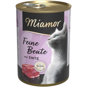 Puszka karmy Miamor z białym kotem o niebieskich oczach i mięsem; etykieta "Feine Beute mit Ente" oraz "+Taurin Getreidefrei".