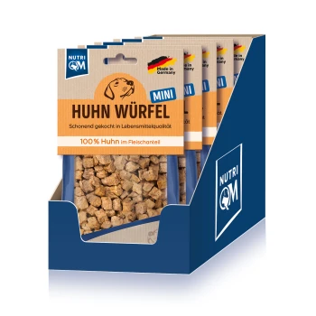 Mini-Hühnchenwürfel für Hunde, beschriftet "Huhn Würfel," hergestellt in Deutschland, mit 100% Hühnchen in einer Auslagebox.