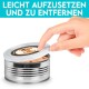 Eine Hand hebt den Deckel von einer silbernen Hundefutterdose mit einem Cartoon-Hund und dem Text "DANKE DASS DU MICH FÜLLST."
