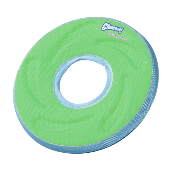 Green Chuckit! Zipflight dog toy with a circular design and a central hole, featuring a textured surface and blue trim.