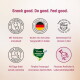 Sechs hypoallergene KatKare-Snackdosen auf einer Küchenarbeitsfläche mit der Überschrift „6 Unwiderstehliche Sorten“ und Geschmacks-Icons.