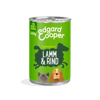 Grüne Dose mit Edgard Cooper Hundefutter, beschriftet mit "Getreidefrei Lamm & Rind" für erwachsene Hunde, mit Illustrationen eines Hundes und eines Löwen.