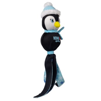 Black and white penguin dog toy wearing a blue winter hat and scarf, with "KONG Wubba" text on its body.