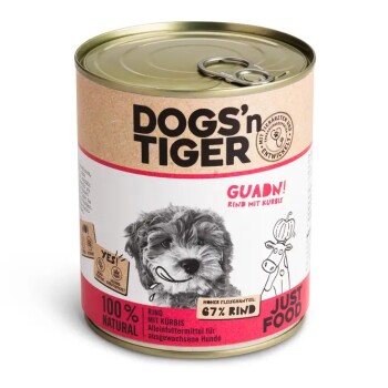 Dosen-Hundefutter beschriftet mit 'DOGS'n TIGER GUADN! Rind mit Kürbis', mit einem lächelnden Hund auf der Vorderseite, 67% Rindfleisch, 100% natürlich.