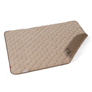 Eine beige Haustiermatte mit einem gesteppten Design, teilweise aufgerollt, mit einem braunen Rand und einem Etikett, das "Doctor Bark" liest.