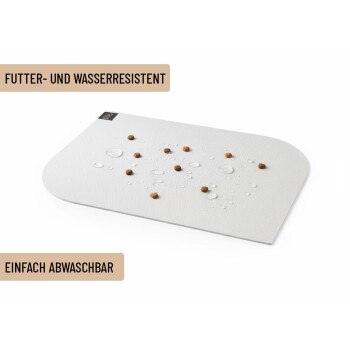 Wasserdichte und futterresistente Haustier-Futtermatte mit verstreutem Trockenfutter und Wassertropfen, beschriftet mit „Futter- und Wasserresistent“ und „Einfach abwaschbar“.