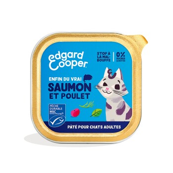 Emballage de nourriture pour chats Edgard Cooper avec un chat de dessin animé, étiqueté "Enfin du vrai saumon et poulet," avec une bordure dorée et un fond bleu.