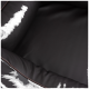 Nahaufnahme eines dunkelbraunen Haustierbettes mit plüschigen, gepolsterten Kanten, mit einer glatten, lederähnlichen Textur.