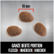 Drei Stücke Haustierfutter auf einer metallischen Oberfläche, die 10 mm messen, mit Text darunter, der "GANZE BEUTE PORTION FLEISCH | INNEREIEN | KNOCHEN" besagt.